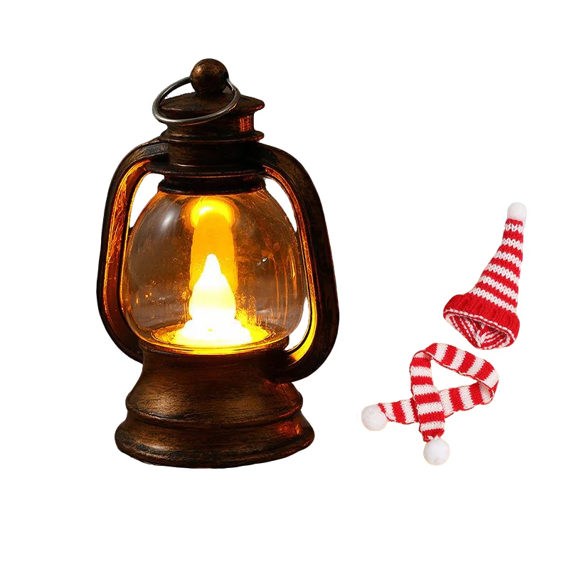 Mini snemandslanterne med huer og tørklæder